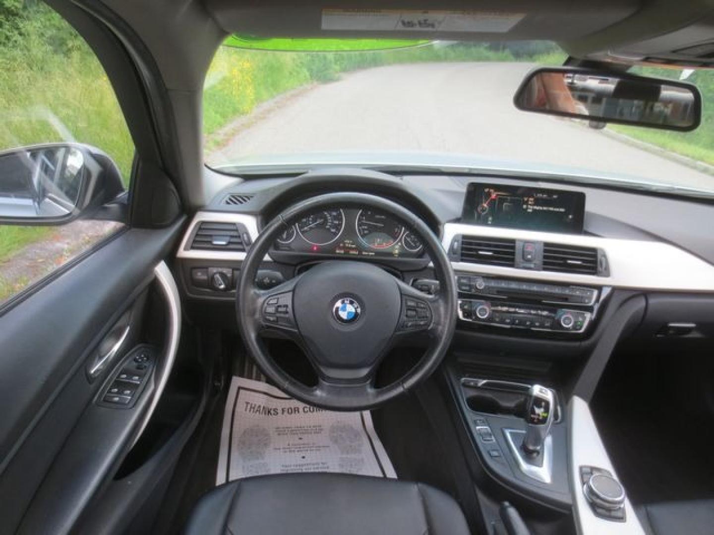 2016 Blue /Black BMW 3-Series (WBA8E5G59GN) with an 2.0l 4cyl Turbo engine, Automatic transmission, located at 270 US Route 6, Mahopac, NY, 10541, (845) 621-0895, 41.349022, -73.755280 - Photo#8